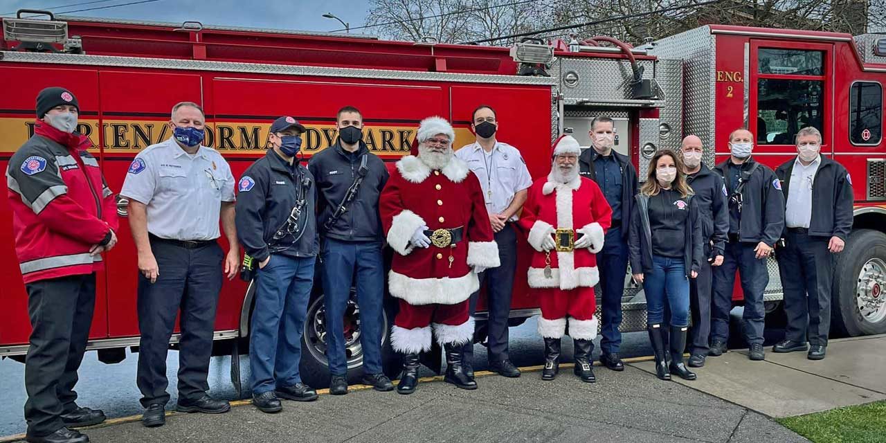 Local firefighters spread holiday cheer to 25 families in region